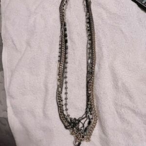 Express gold beaded long necklace. Lots of rows